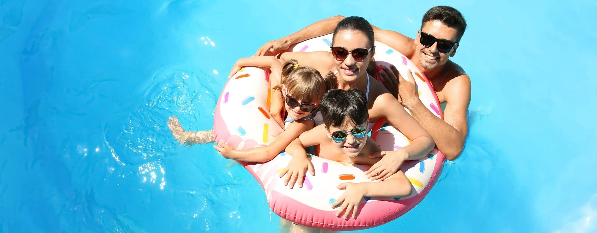 Family In Pool